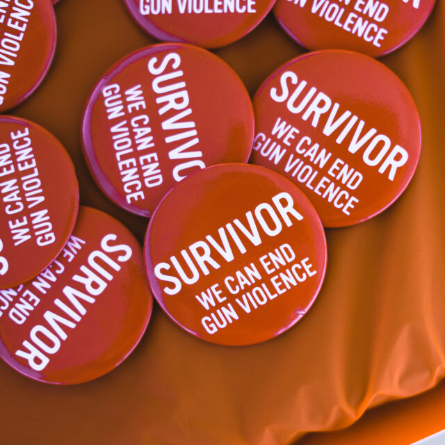 A pile of buttons with the word, “survivor” on all of them.