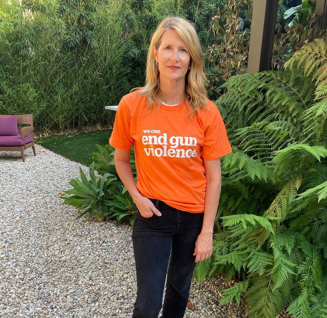 Actress Laura Dern wears an orange shirt for Wear Orange