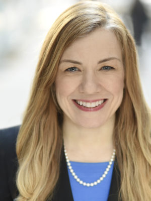 Doreen Marshall smiles at the camera in her headshot