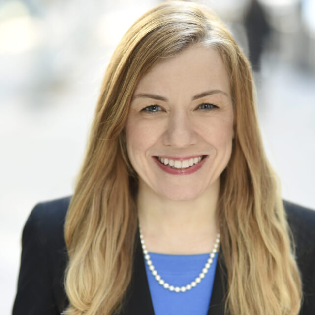 Doreen Marshall smiles at the camera in her headshot