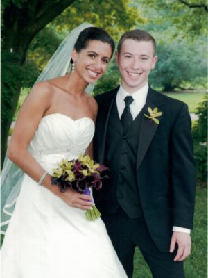 Adriana smiles on her wedding day with her brother Luc