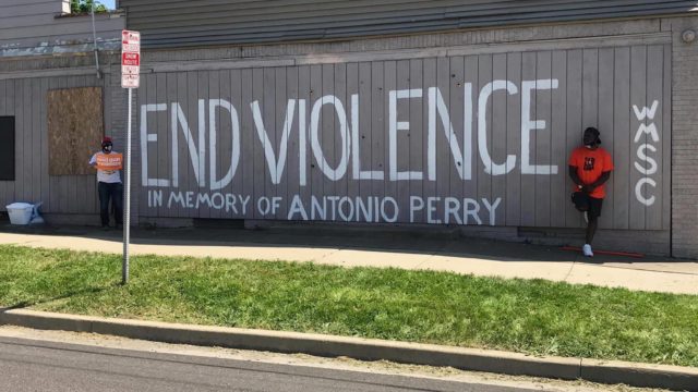An End Violence mural on the side of a building in Illinois