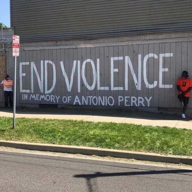An End Violence mural on the side of a building in Illinois