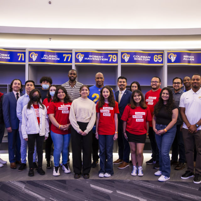 Students Demand Action Summer Leadership Academy participants pose for a photo with the Los Angeles Rams