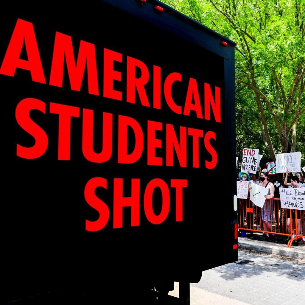 Sign that says “American Students Shot”
