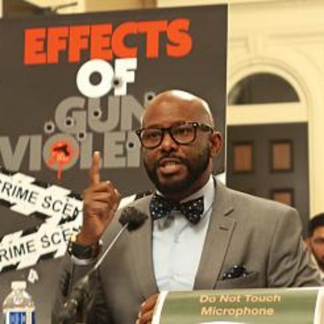 Mike A. Gipson speaking at a podium