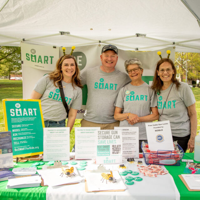 Volunteers tabling at a Be SMART event