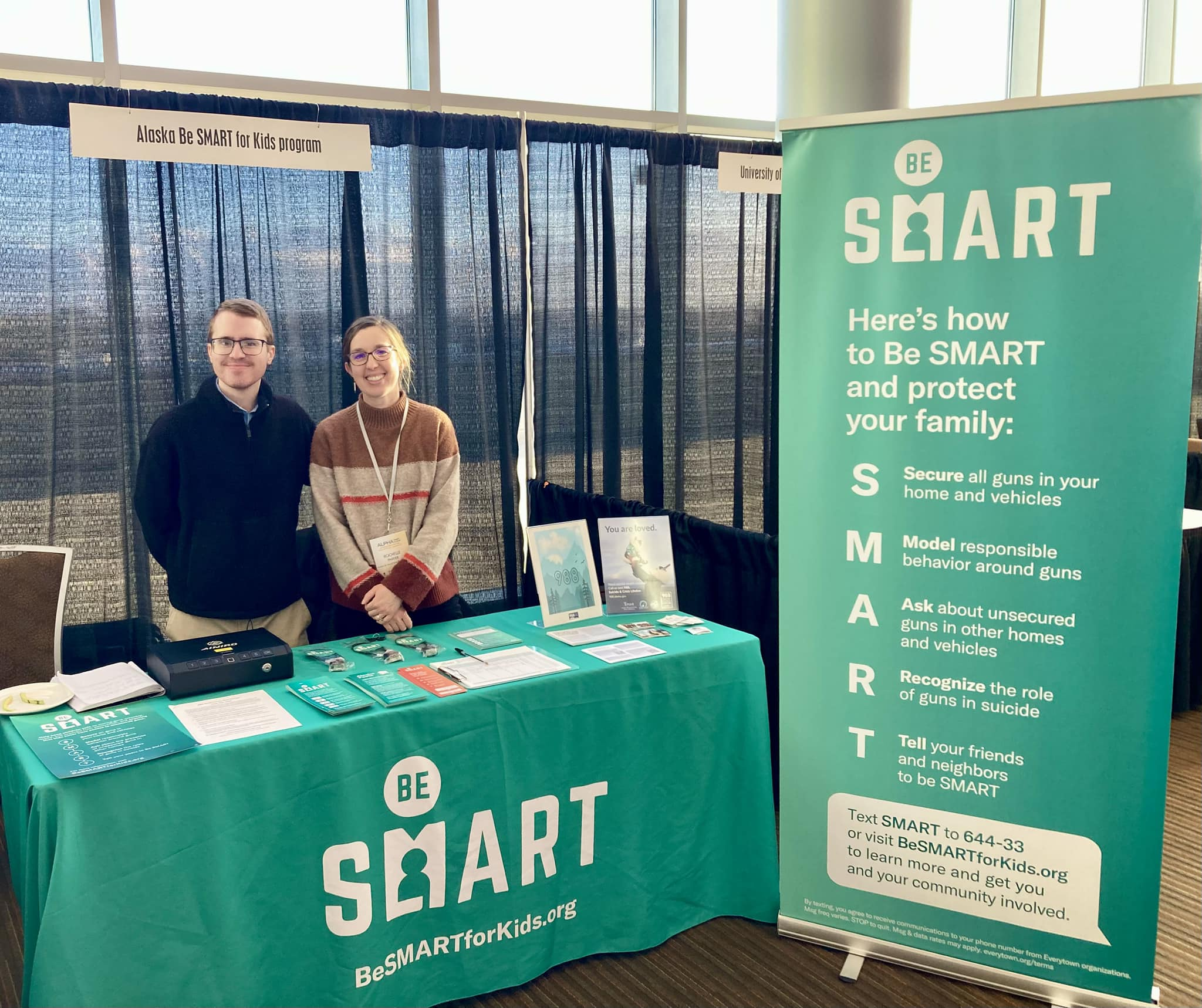 Alaska Chapter Lead Rochelle Parker and another volunteer table for Be SMART at a community event.